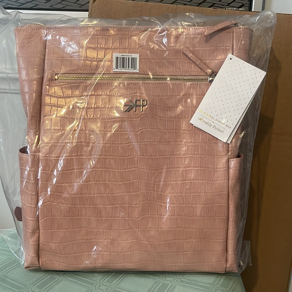 Minimal Water Resistant Faux Leather Diaper Backpack
FRESHLY PICKED - Picture 7 of 9
